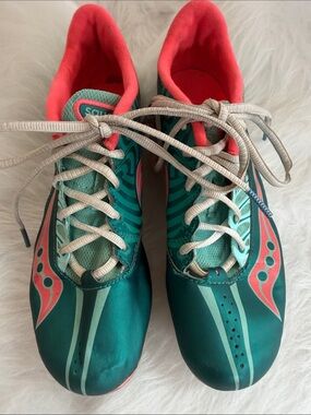 Saucony Women's track and field sprinters spikes. Teal and Coral